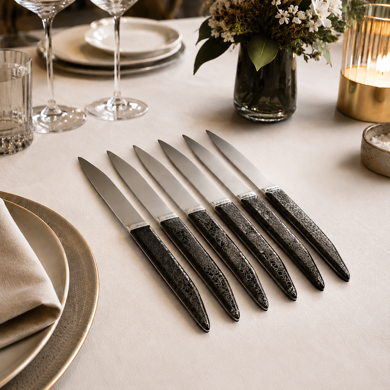 Table knives with a polished charcoal handle