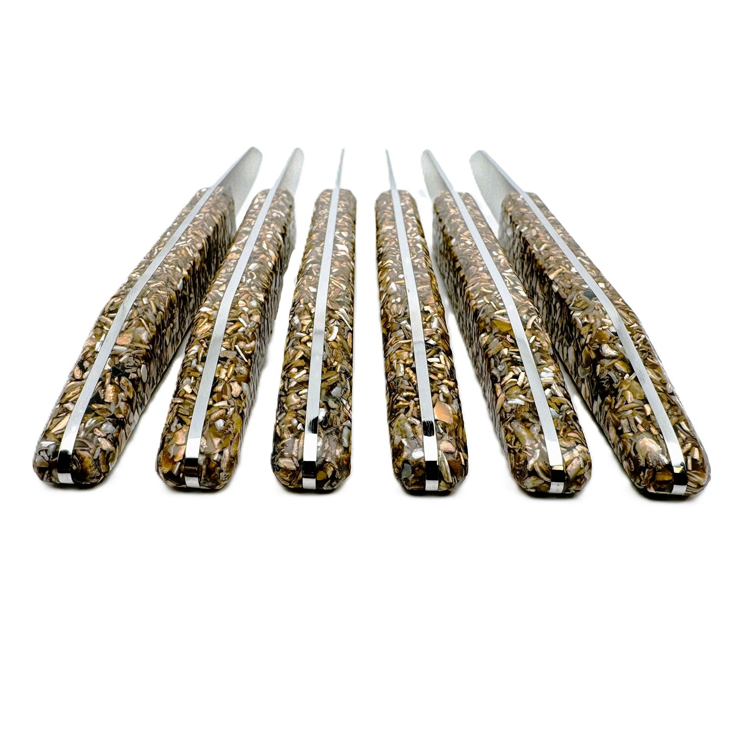 table knives with a handle made from recycled mussel shells
