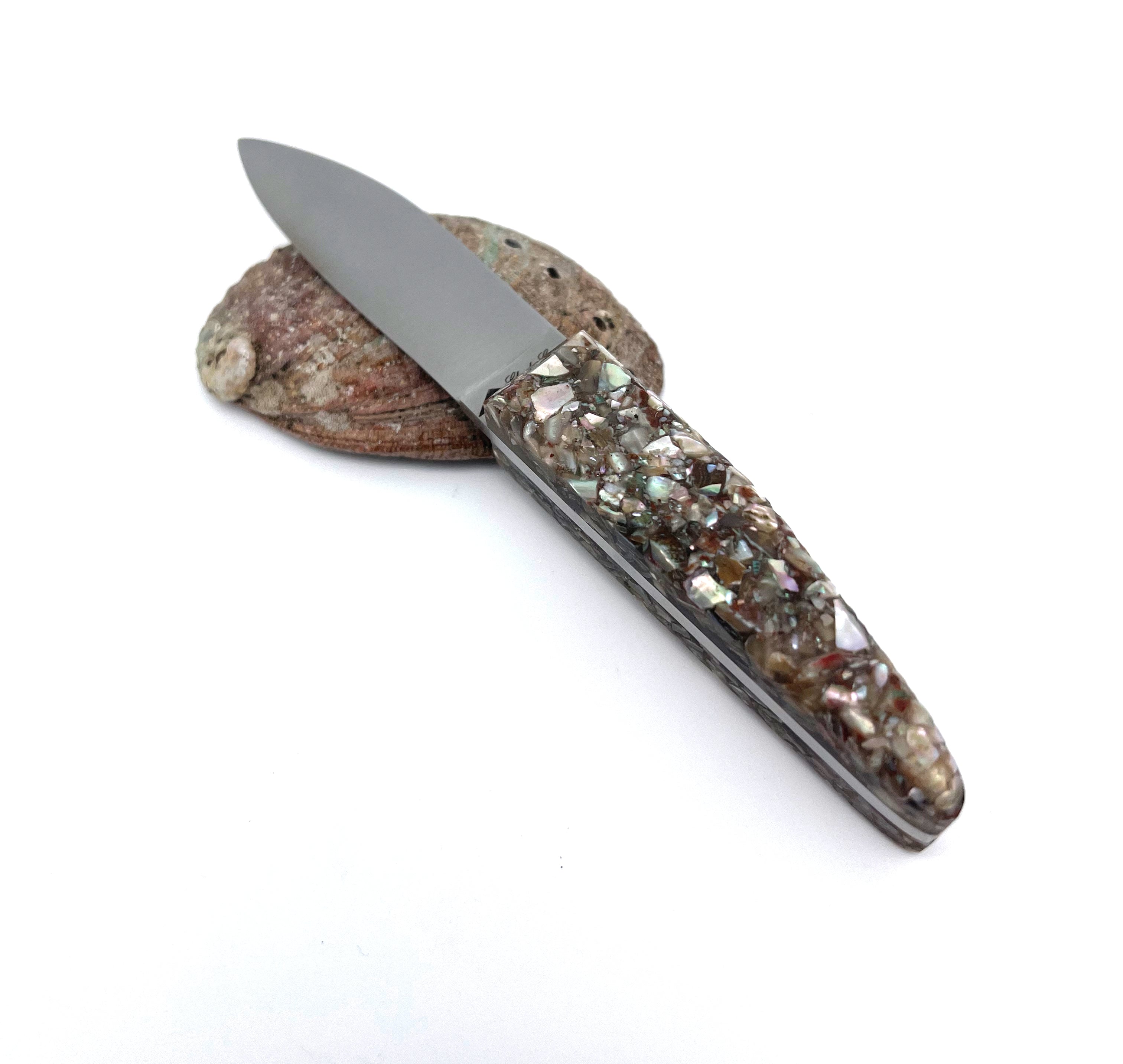 Small oyster knife with a handle made from recycled oyster shells