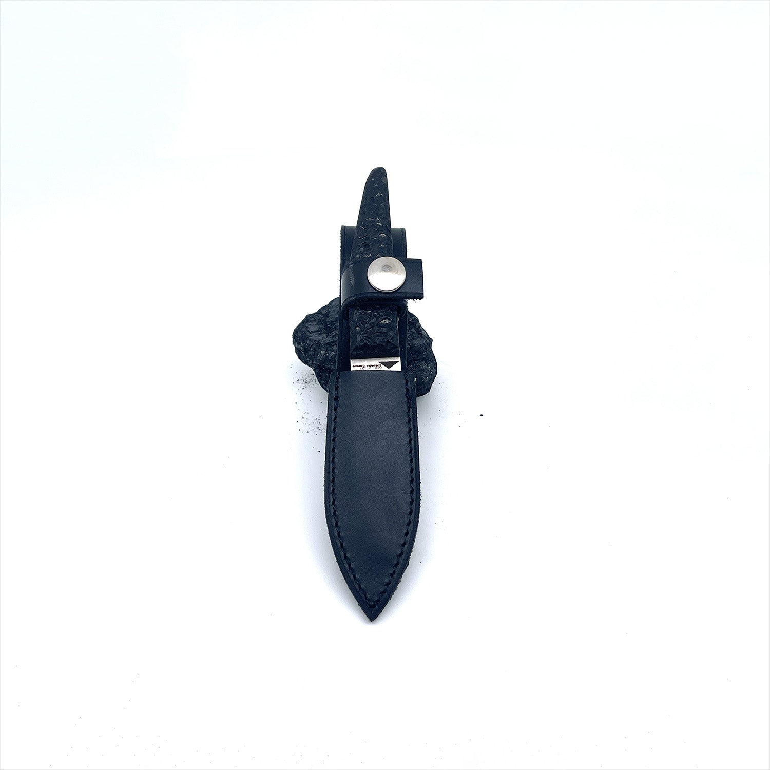 Small cutter with a polished charcoal handle