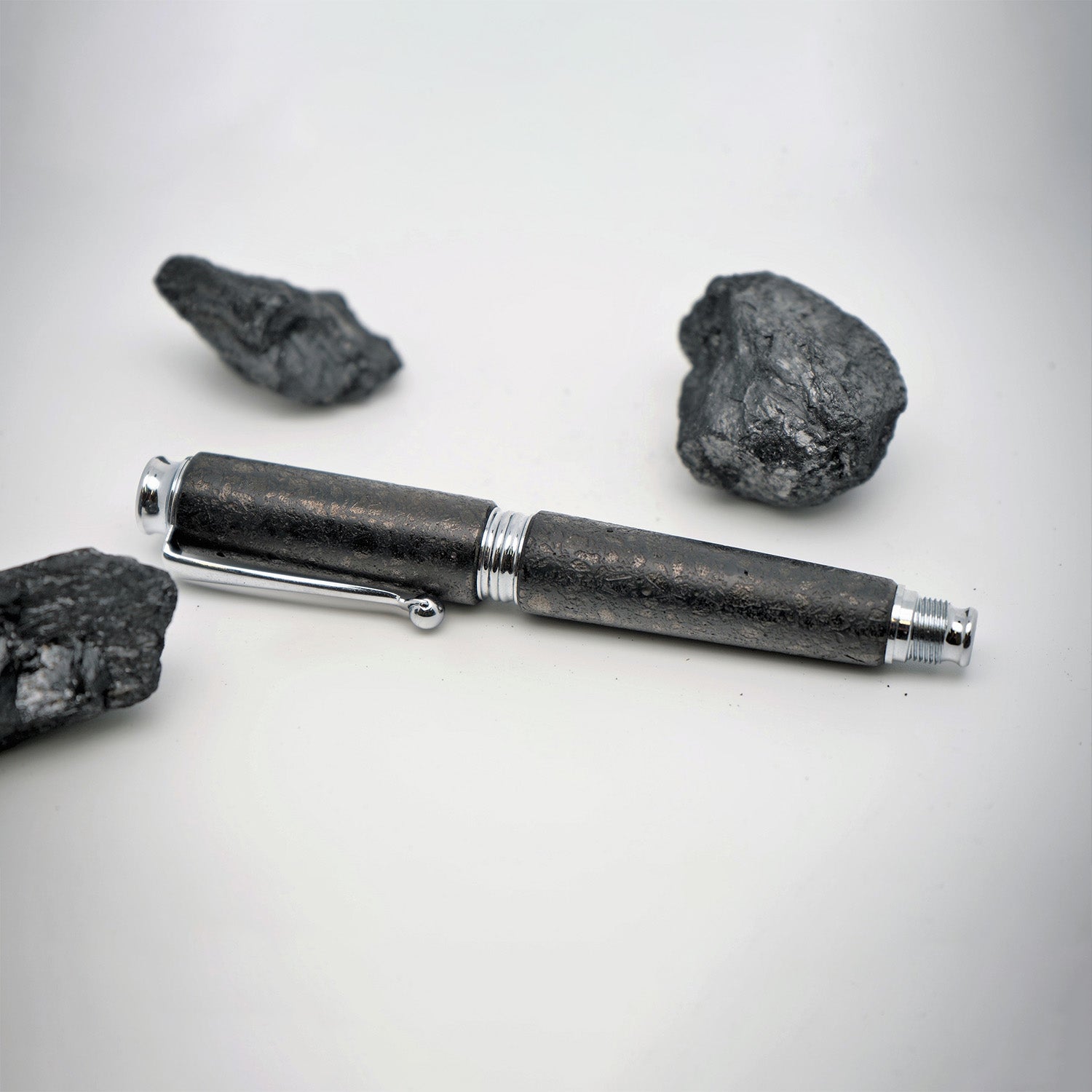 Raw charcoal roller pen