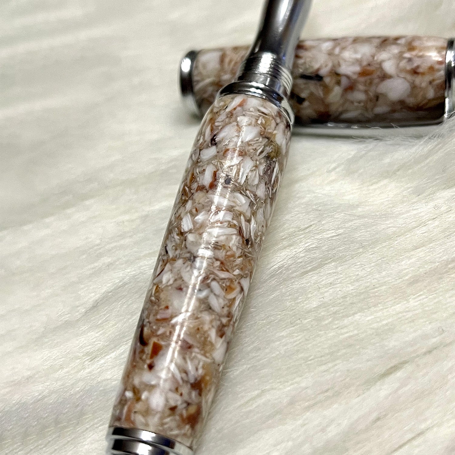 Stylo roller en coquille saint-Jacques