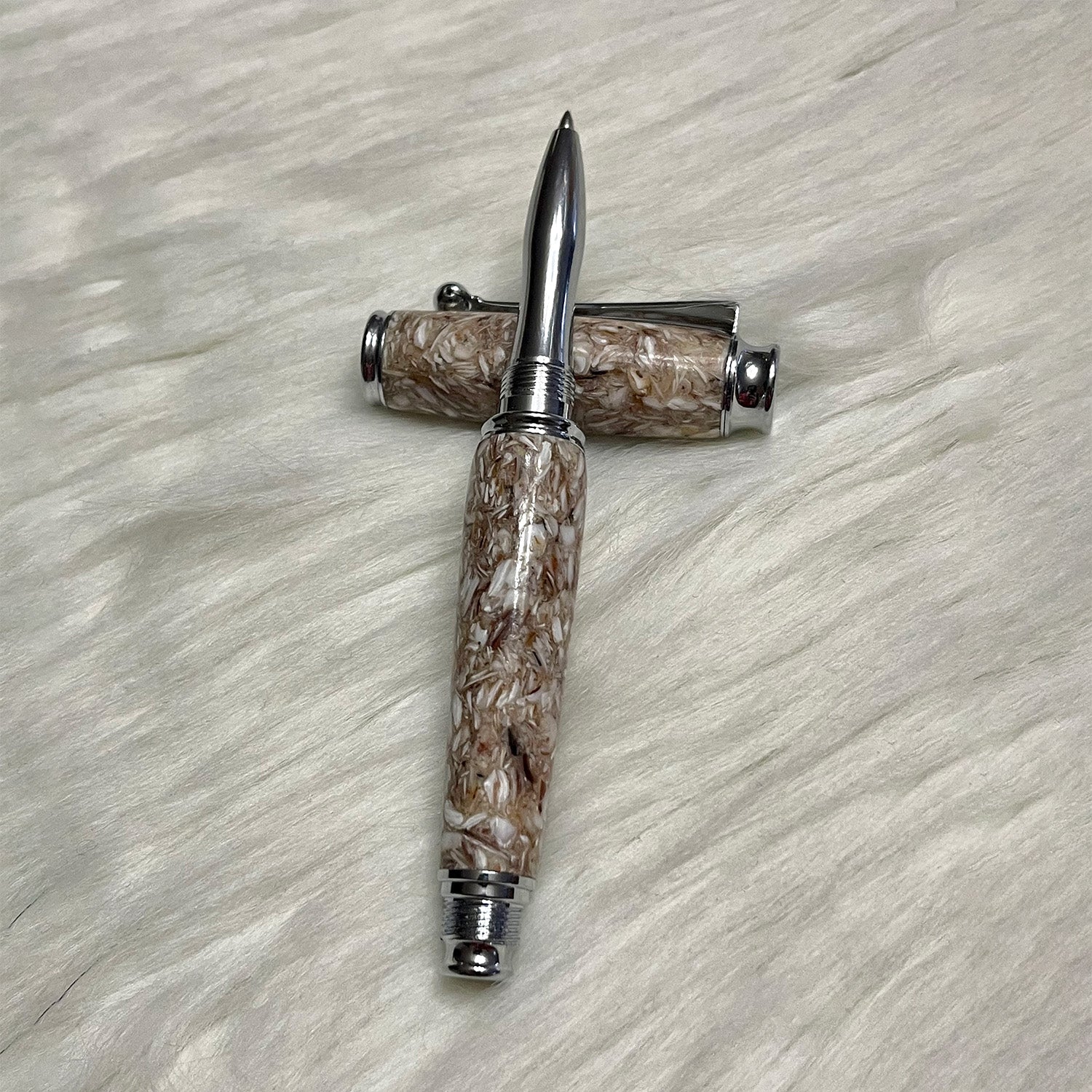 Stylo roller en coquille saint-Jacques