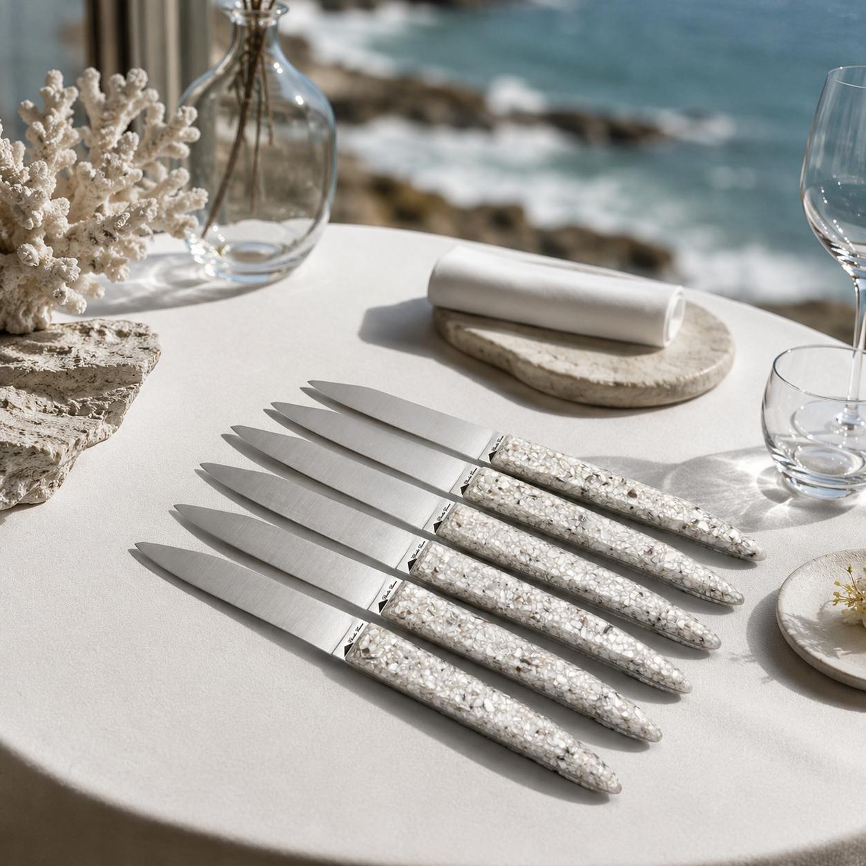 Table knives with oyster shell handles
