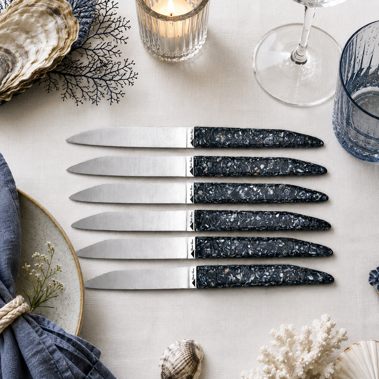 table knives with a handle made from recycled mussel shells