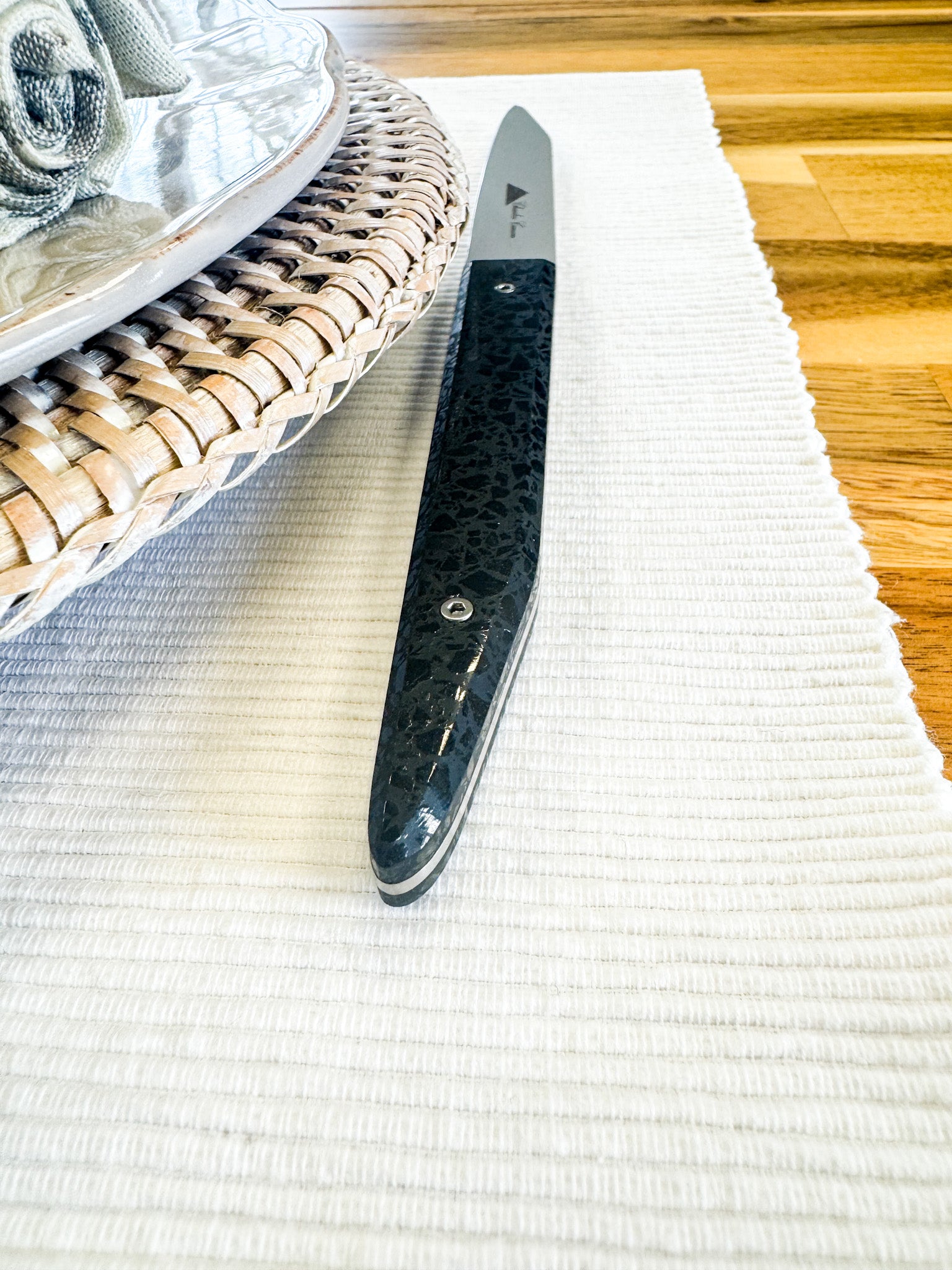 6 Table knives with polished charcoal handles