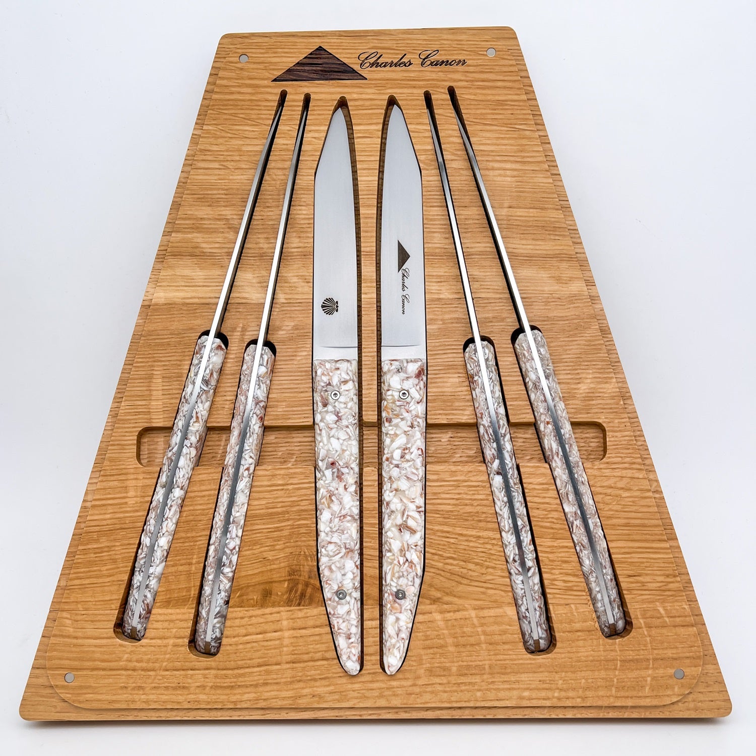 6 table knives with scallop shell handles