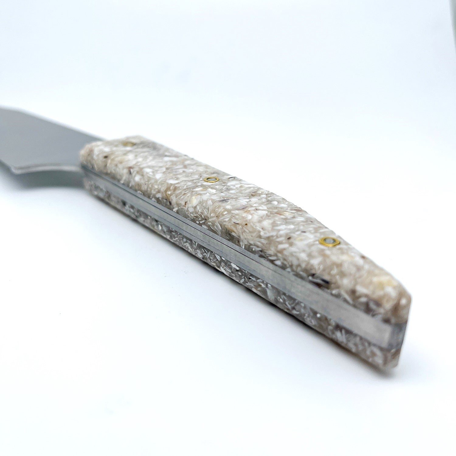 Chef's knife with oyster shell handle