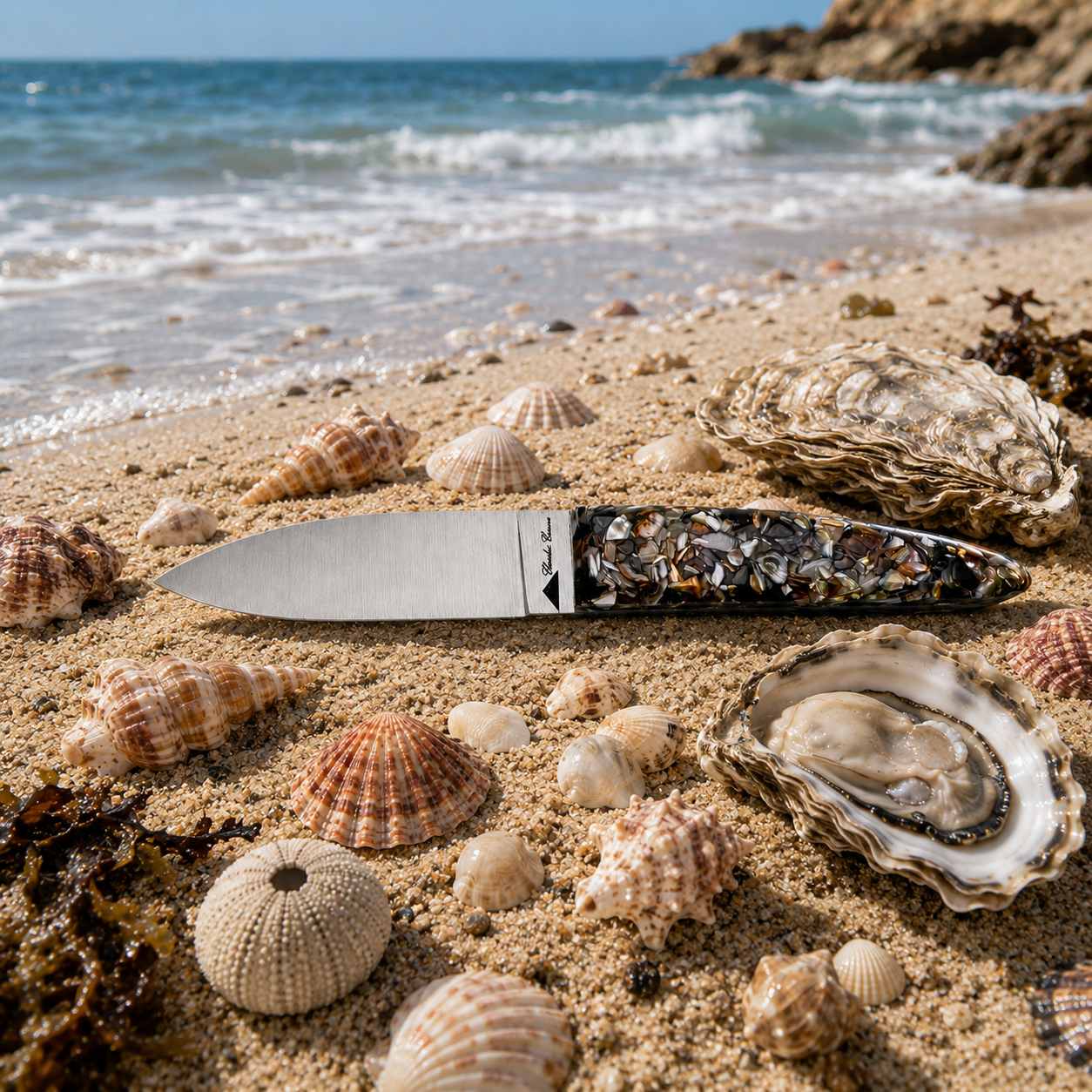Small oyster knife with a handle made from recycled oyster shells