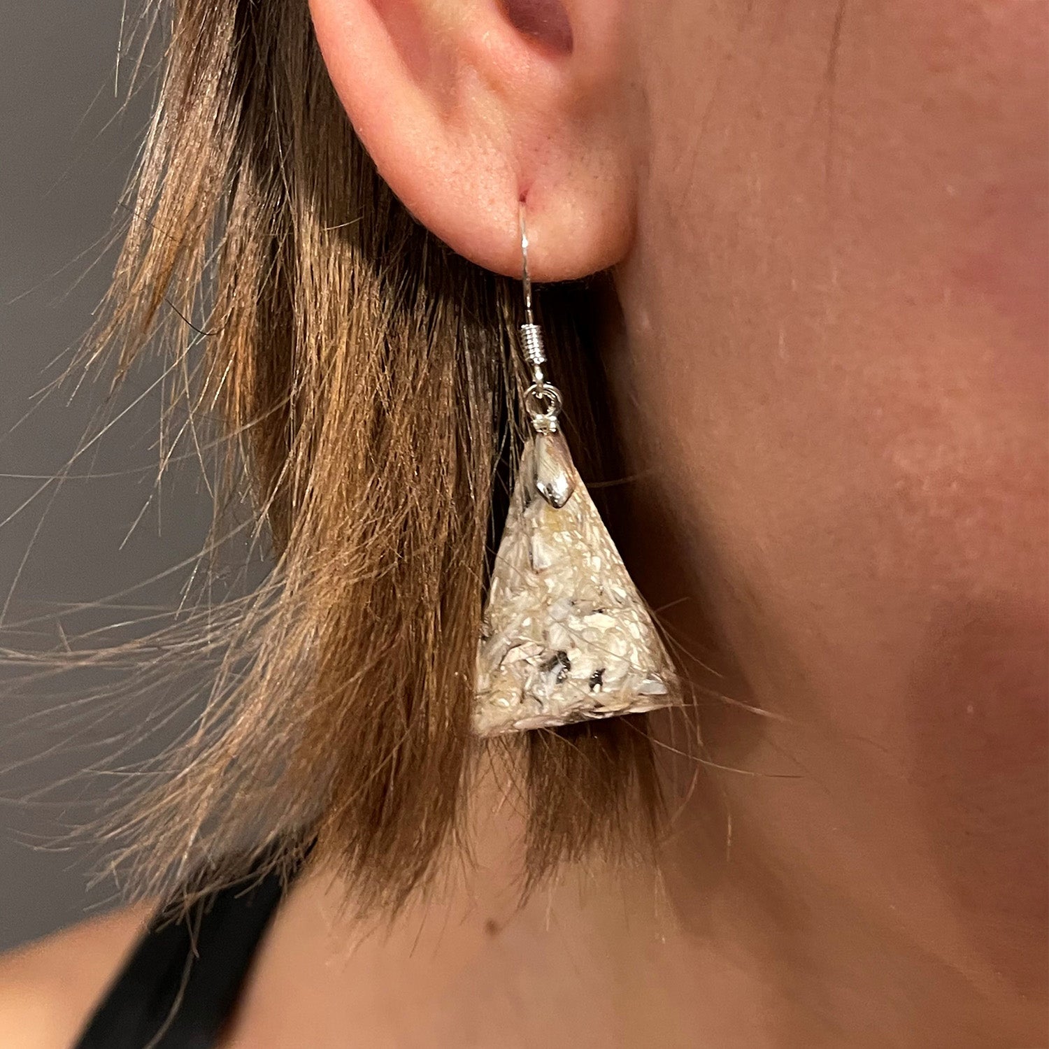 Triangle earrings made from recycled oyster shells