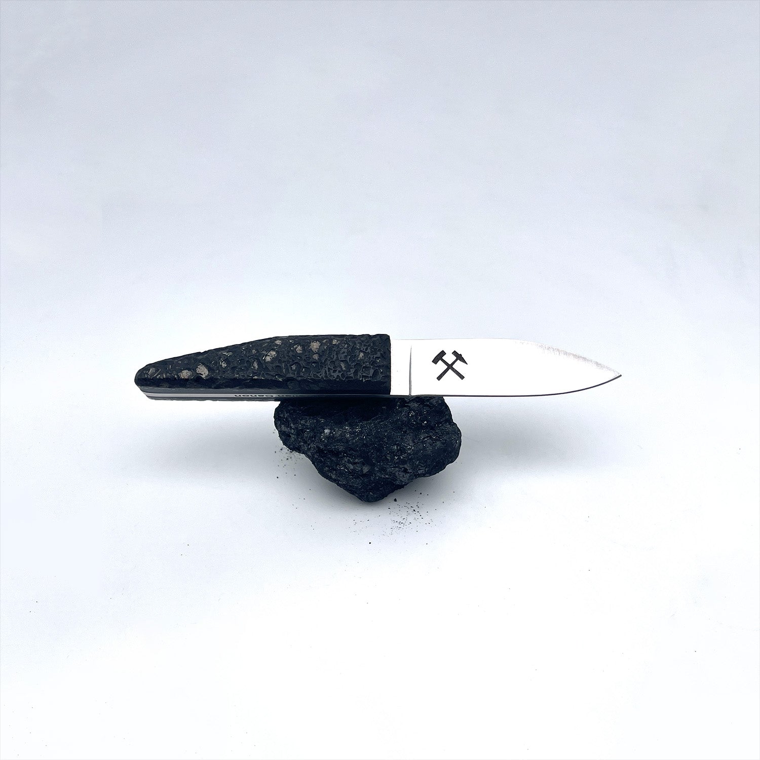 Small oyster knife with a raw charcoal handle