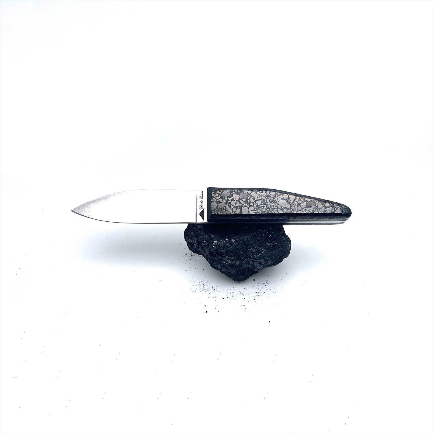 Small cutter with a polished charcoal handle