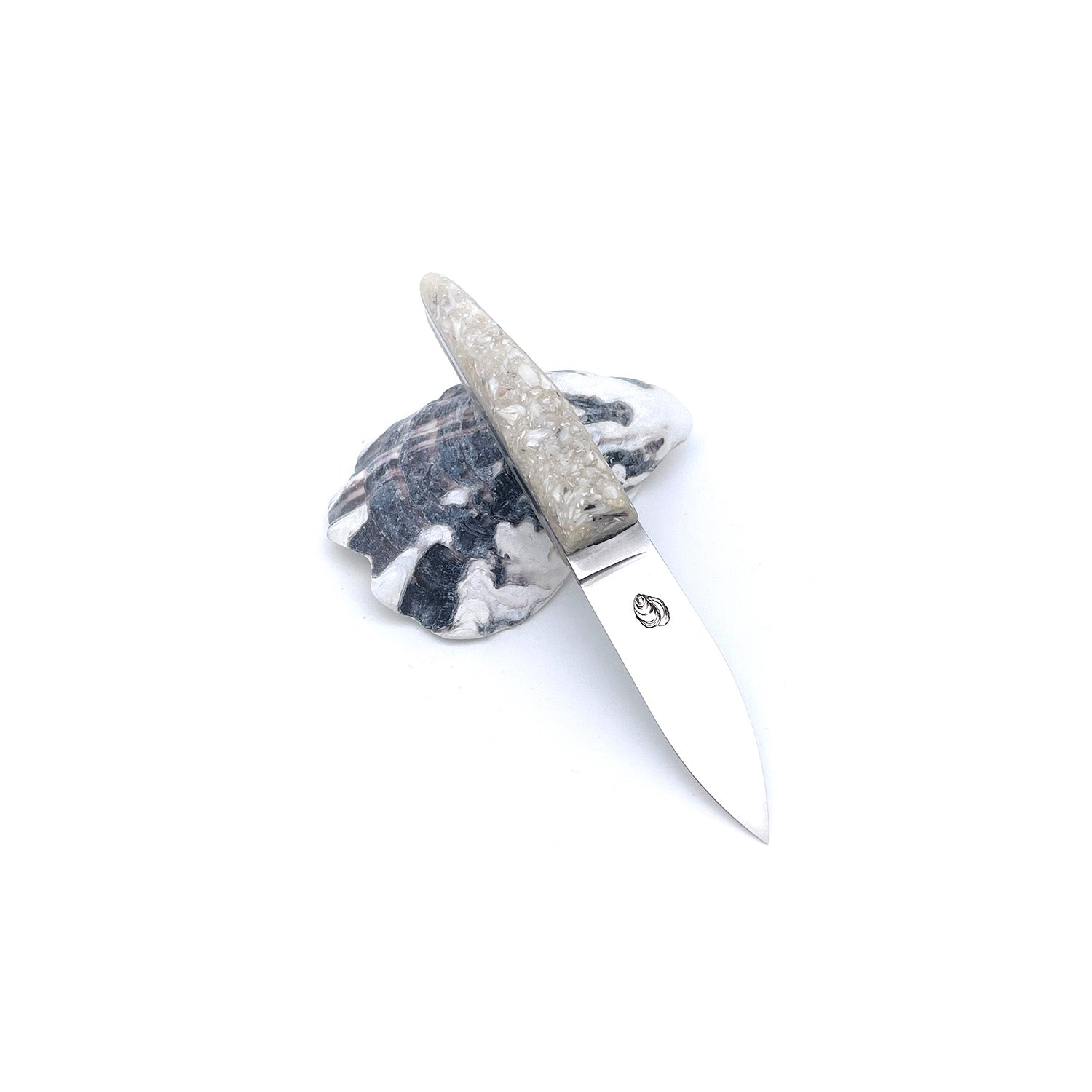 Small cutter with a handle made from recycled oyster shells
