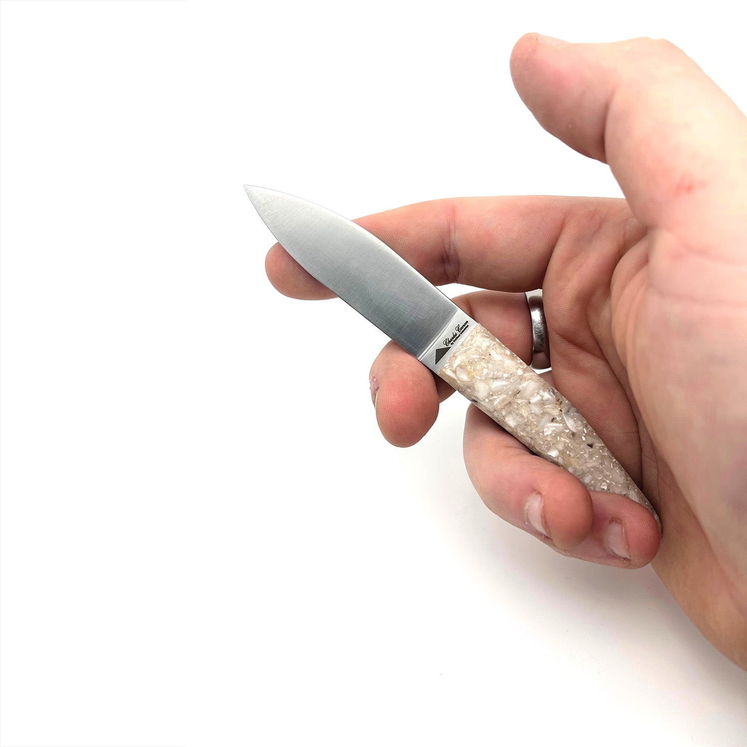 Small cutter with a handle made from recycled oyster shells
