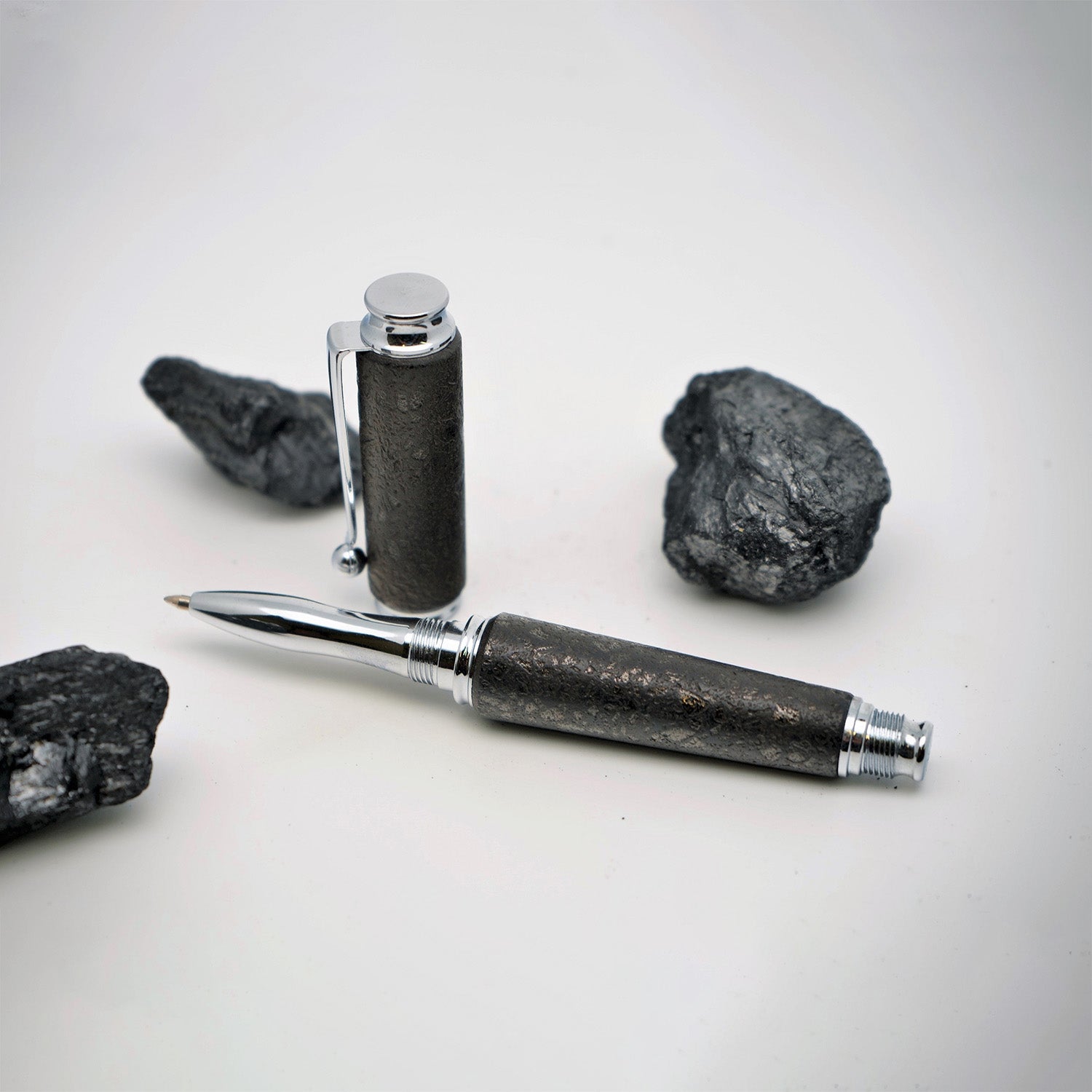 Raw charcoal roller pen