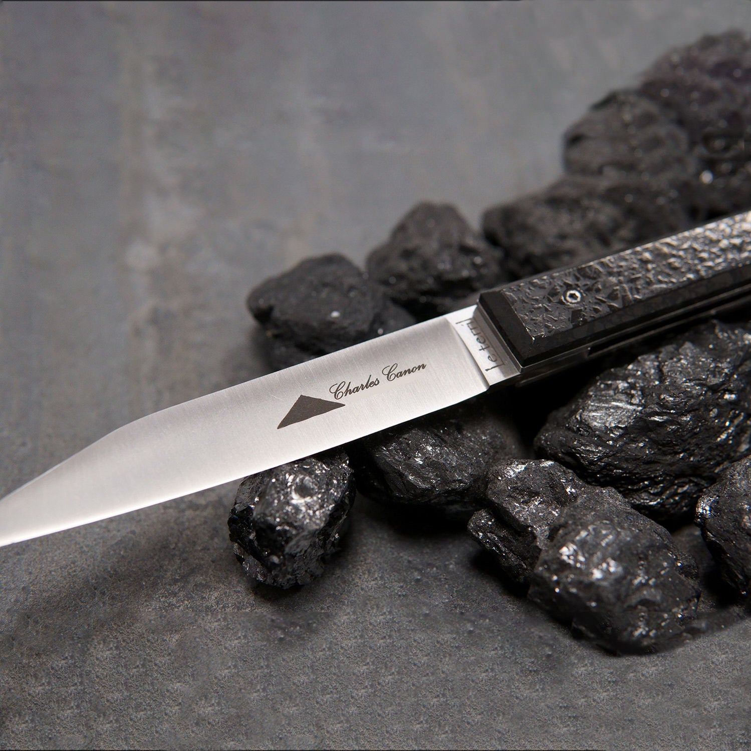 Charcoal handle slag knife (polished finish)